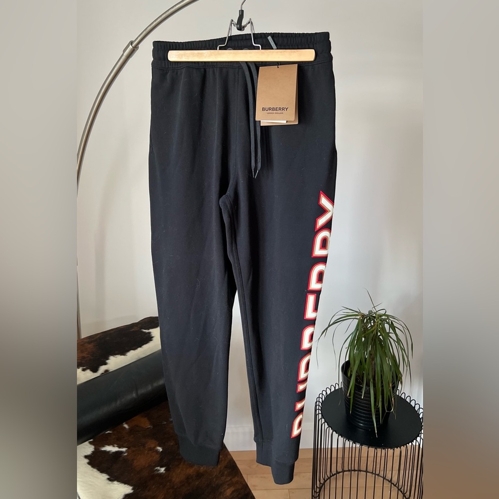 Burberry Black sweatpants with orange logo